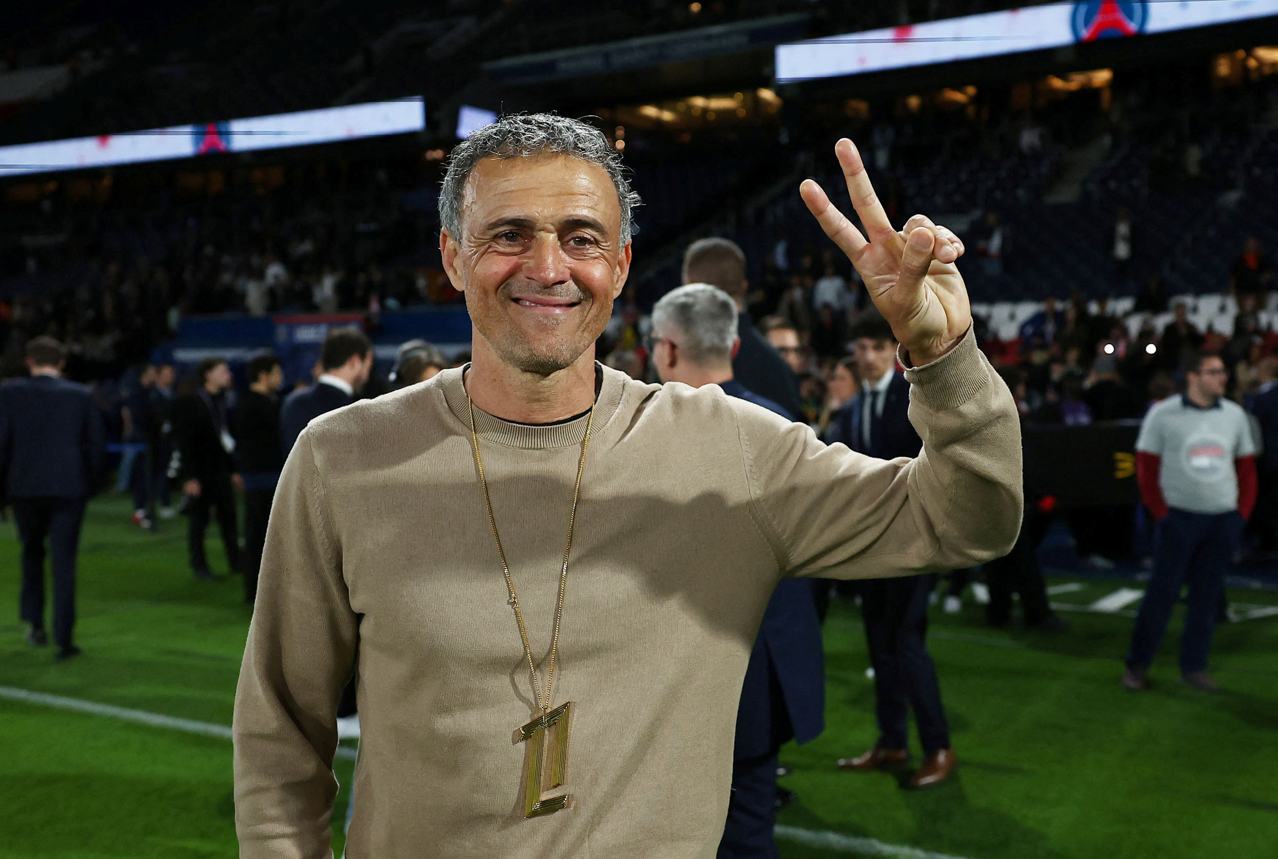 Soccer Football - Ligue 1 - Paris St Germain v Auxerre - Parc des Princes, Paris, France - May 17, 2025 Paris St Germain coach Luis Enrique poses after winning Ligue 1 Pool via REUTERS/Franck Fife