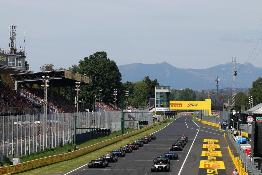 Cars line up on the grid ahead of the race start