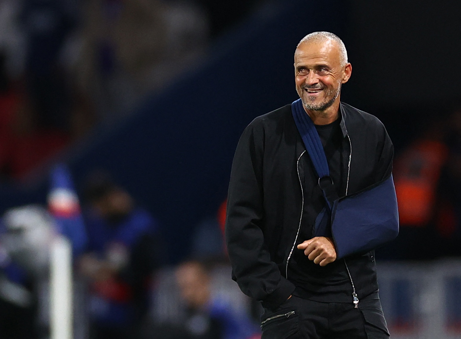 Soccer Football - UEFA Champions League - Paris St Germain v Atalanta - Parc des Princes, Paris, France - September 17, 2025 Paris St Germain coach Luis Enrique celebrates after the match REUTERS/Abdul Saboor