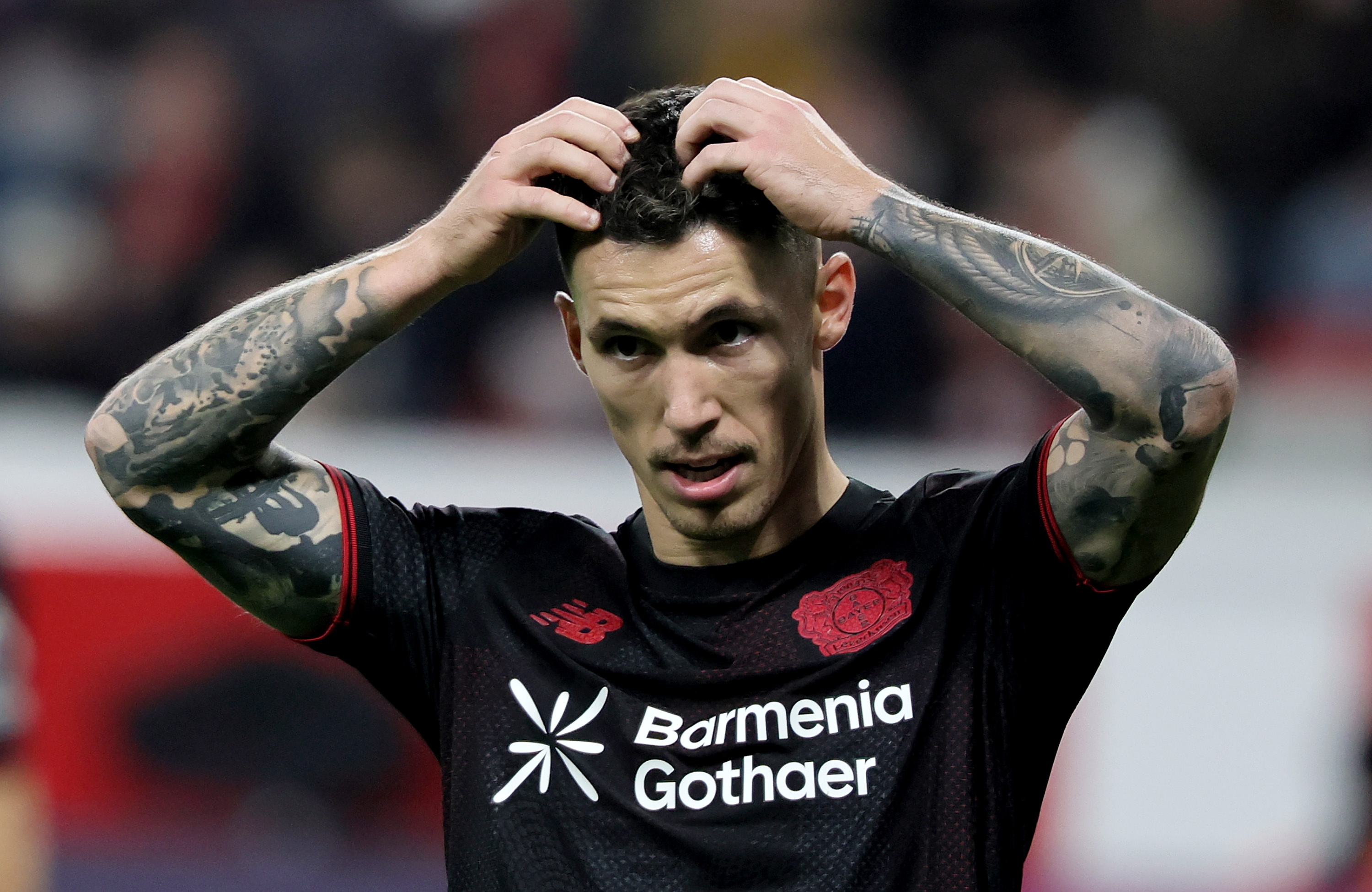 LEVERKUSEN (Germany), 08/11/2025.- Alejandro Grimaldo of Leverkusen reacts during the German Bundesliga soccer match between Bayer 04 Leverkusen and 1. FC Heidenheim in Leverkusen, Germany, 08 November 2025. (Alemania) EFE/EPA/RONALD WITTEK CONDITIONS - ATTENTION: The DFL regulations prohibit any use of photographs as image sequences and/or quasi-video.
